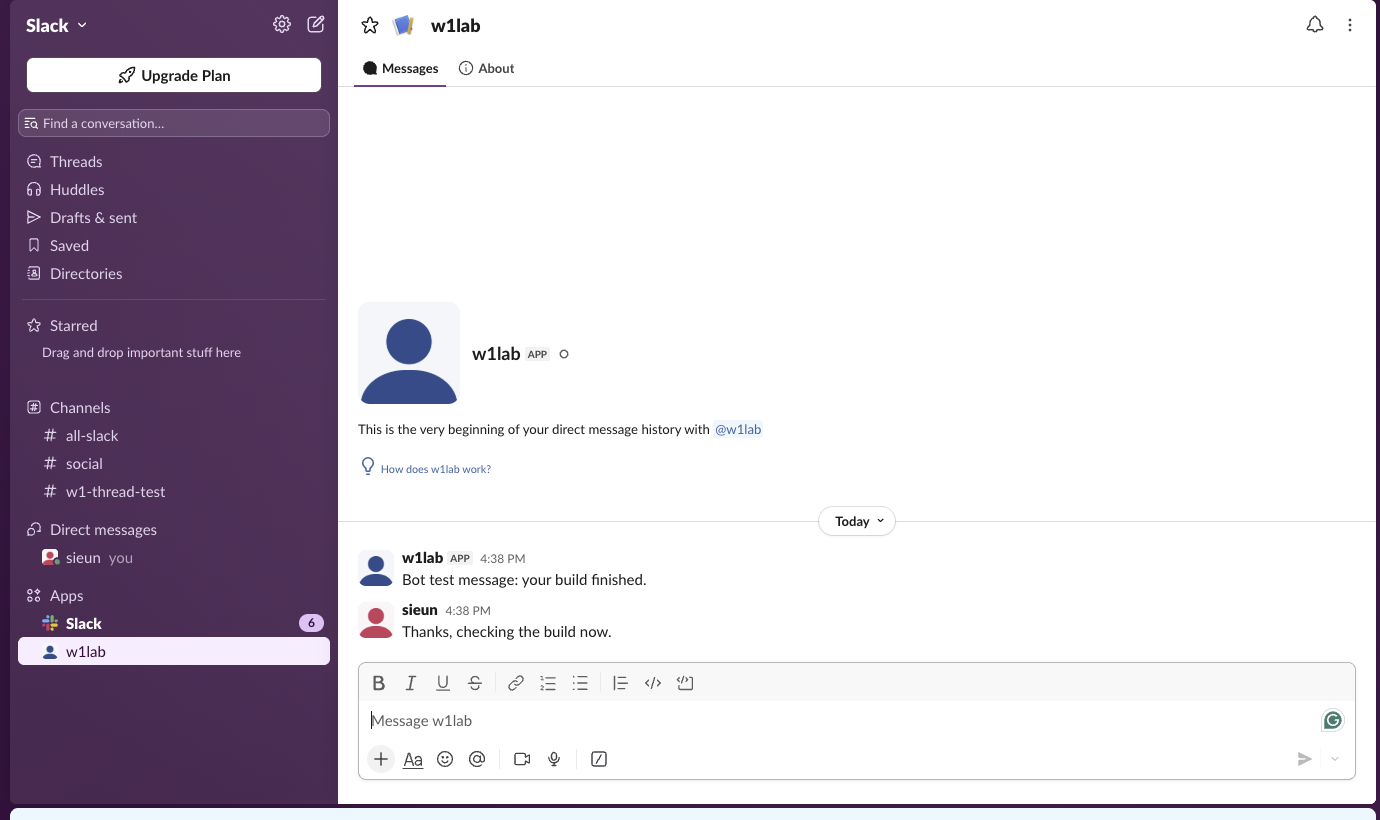The reopened DM with w1lab in Slack web. The history shows the app's message Bot test message: your build finished and our reply Thanks, checking the build now, and the DM is back in the sidebar under Apps