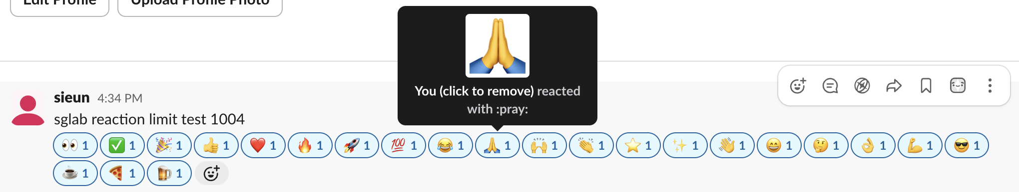 A Slack message with 23 different emoji reactions from one person and the hover note You click to remove