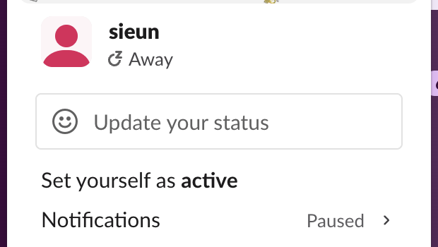 Slack's profile menu in a second browser tab after a manual away was set from another client: the name shows Away and the menu offers Set yourself as active