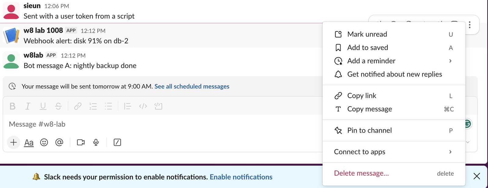 The More actions menu on a message posted by an incoming webhook app in Slack web, ending with Delete message in red; there is no Edit message item