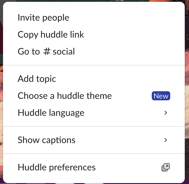 The More actions menu in a Slack huddle: Invite people, Copy huddle link, Go to social, Add topic, Choose a huddle theme (New), Huddle language, Show captions, Huddle preferences