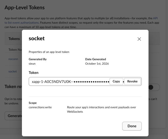 The app-level token dialog in Slack app settings, with the xapp- token masked and the connections:write scope